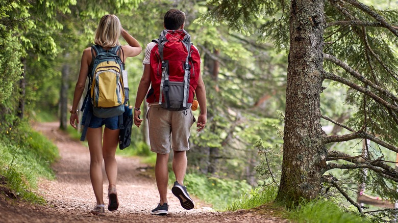 Couple hiking on trail 