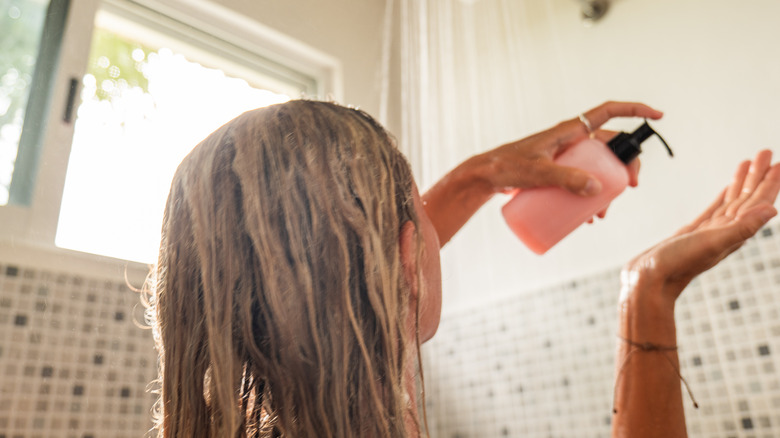 Girl using shampoo