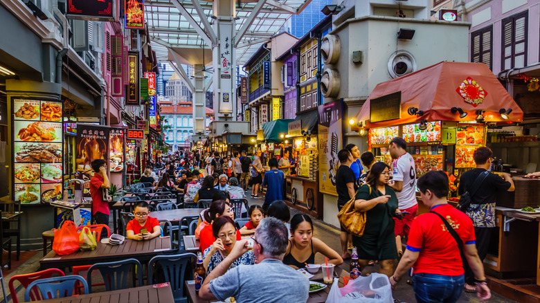 Busy hawker center in Chinatown, Singapore