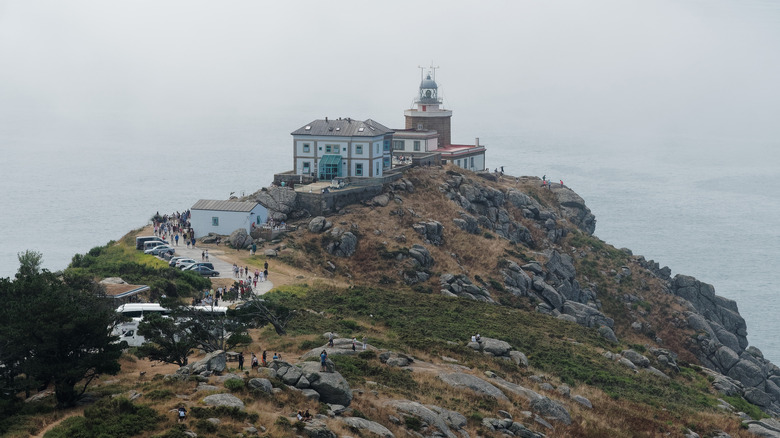 aerial view of Fisterra lighthouse and cliffs in Spain