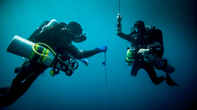 technical divers headed down for deep dive