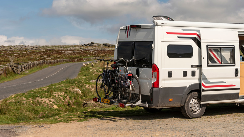 an RV parked on the side of a road