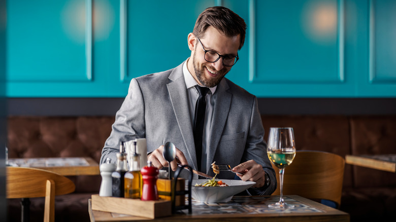 man eating alone 