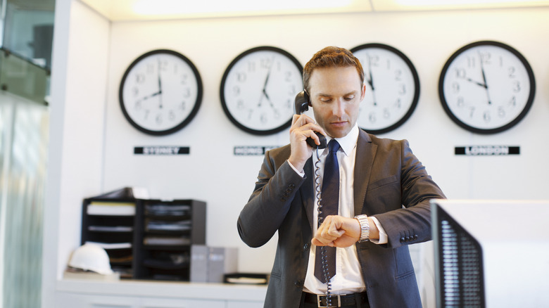 Man looking at his watch