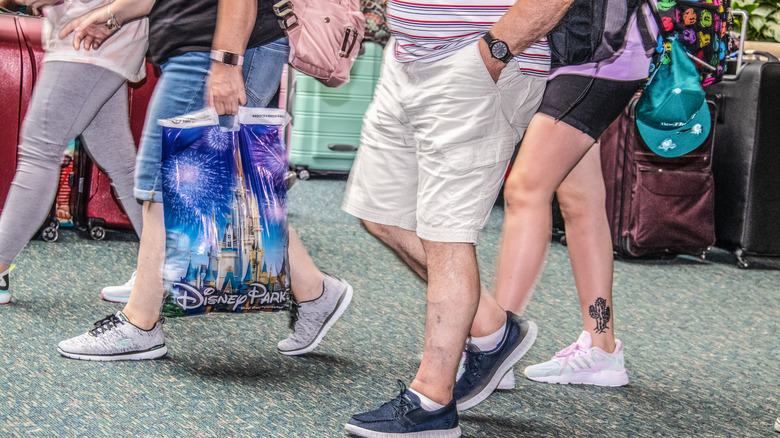 Family walking through Disney World