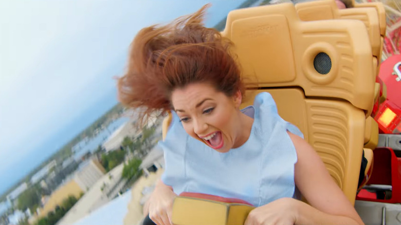 Girl screaming on roller coaster