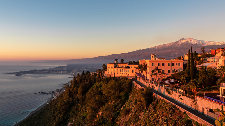 Taormina public gardens and Mount Etna at sunset