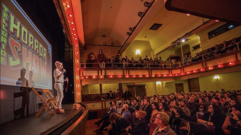 Host onstage at festival screening