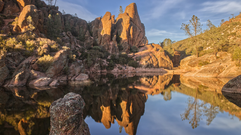 rock formations reflecting in water