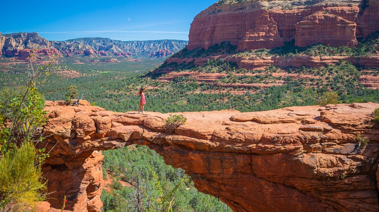 A woman standing on Devil's Bridge