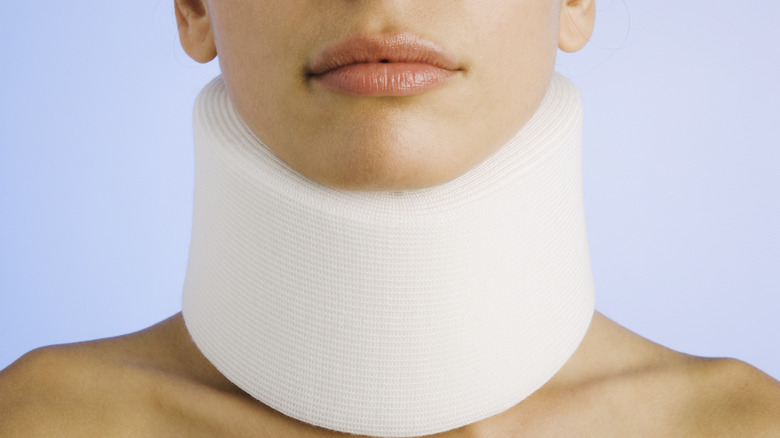 Woman with a neck brace 