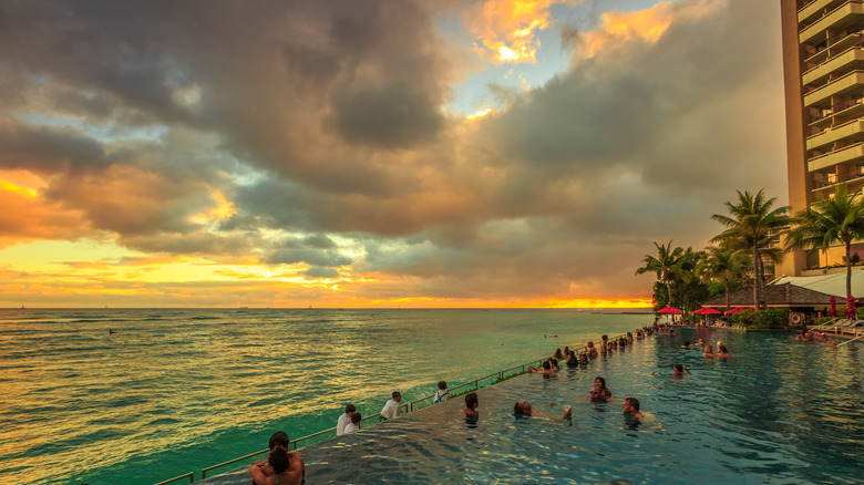 infinity pool at sunset