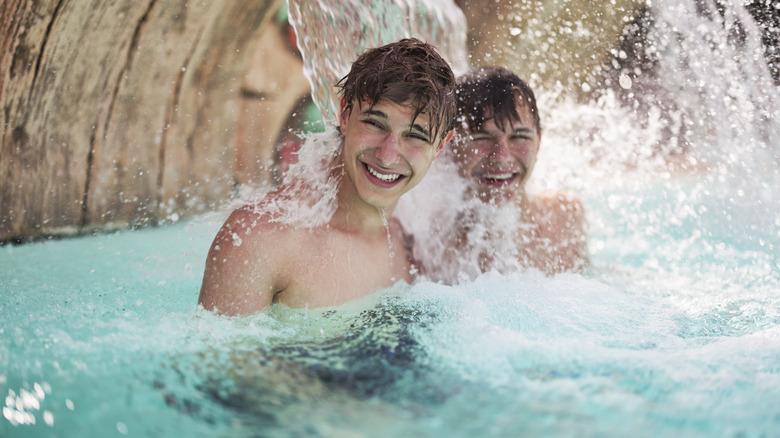 Teenagers smiling at water park