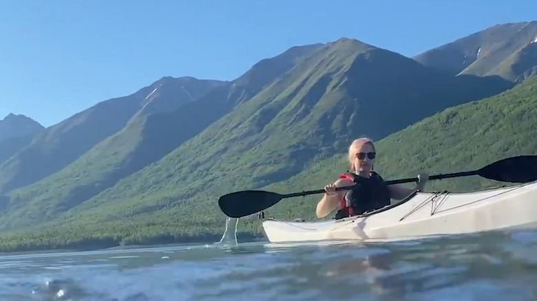 Woman kayaking on Eklutna Lake