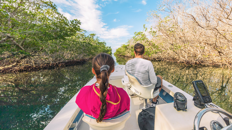 Couple Riding Boat Everglades Florida