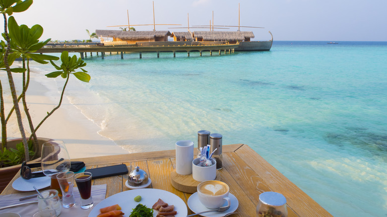 Resort breakfast overlooking dhoni boat