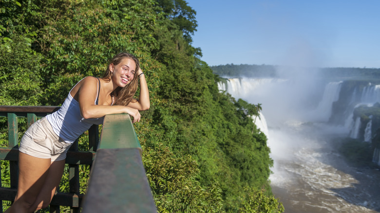 Visitor overlooking Iguazú Falls