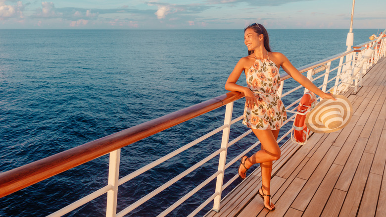 Woman posing on cruise ship deck