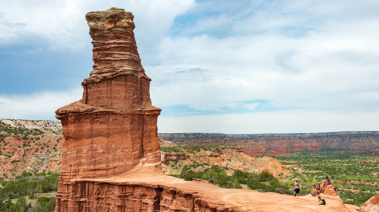 Hikers at Lighthouse rock in Palo Duro Canyon State Park, Texas