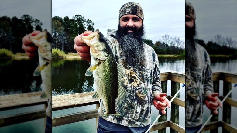 Proud man holding a fish