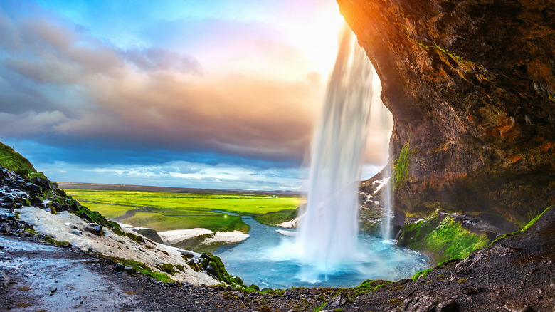 Seljalandsfoss waterfall at sunset