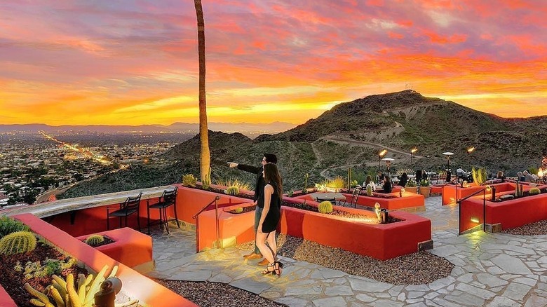 couple standing on patio