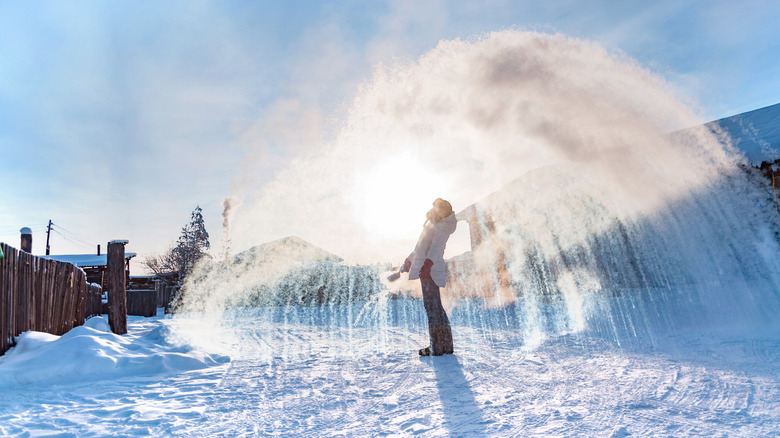 Warm water hose challenge in Oymyakon, Russia