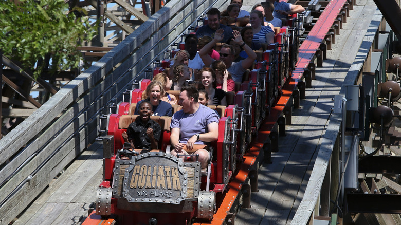 Riders on Goliath roller coaster