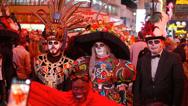 People wearing Halloween costumes, Fremont Street