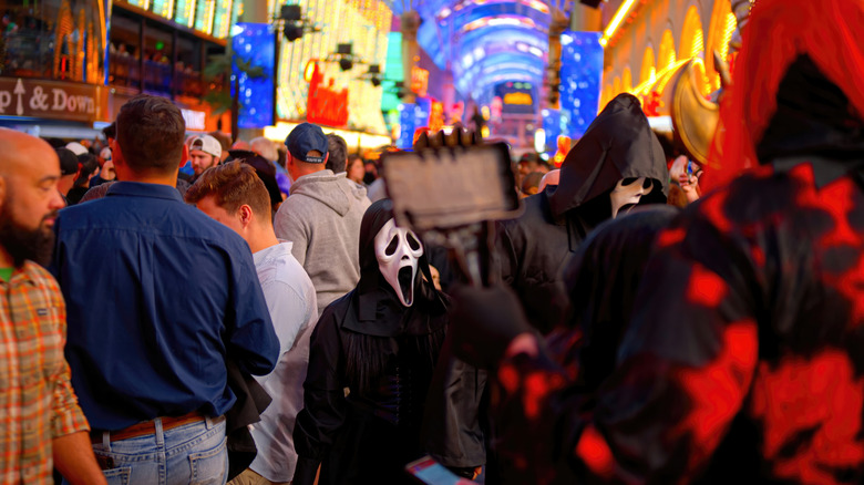 People wearing Scream masks Las Vegas street