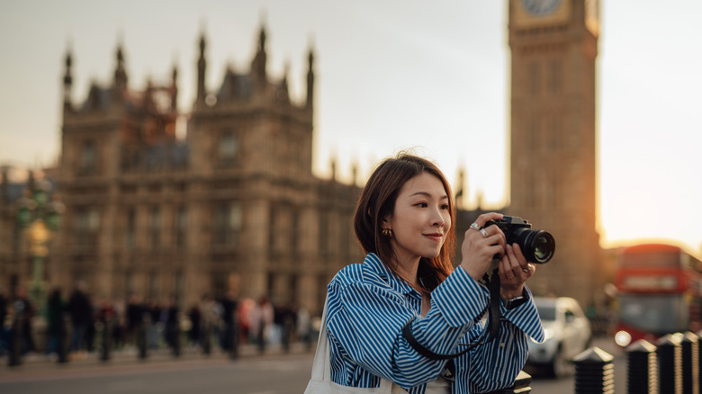 tourist taking photo in London