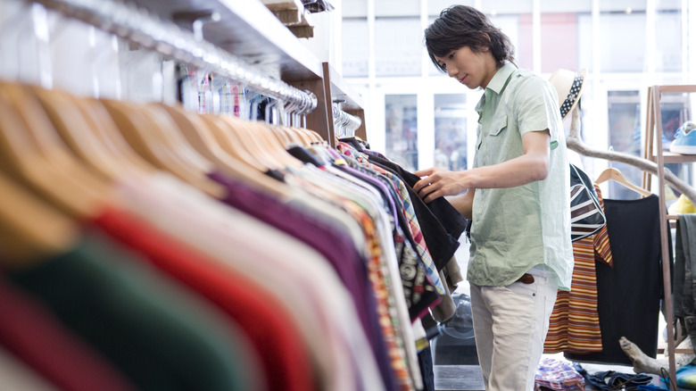 Man clothes shopping