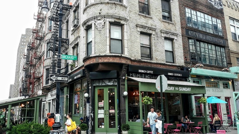 brick buildings and street cafe