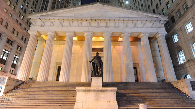 building with columns and statue