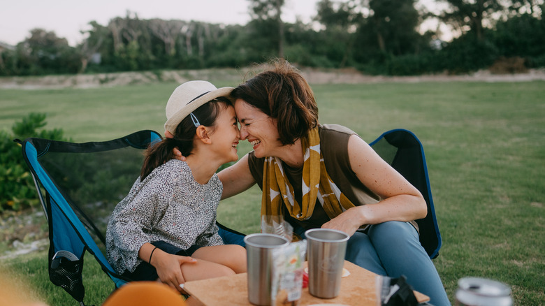 Family dining at campsite