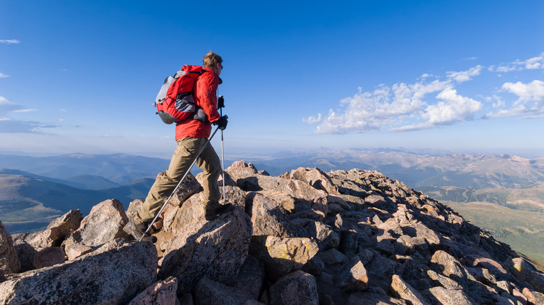 Man summiting Mt. Bierstadt in Colorado