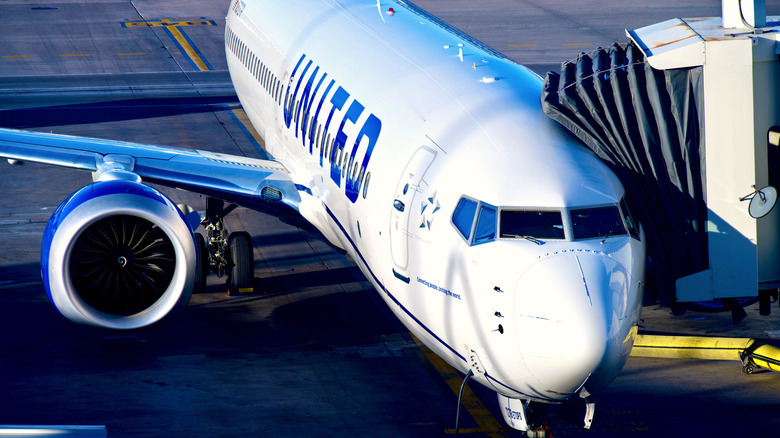 United airplane parked at gate