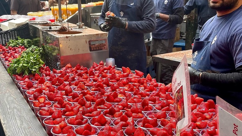 Chocolate-covered strawberries at food stand