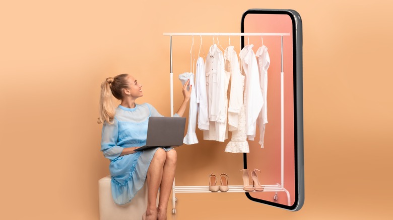 woman looking at a clothing rack