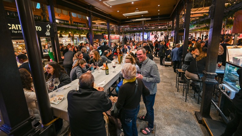 People eating at Mercado San Miguel