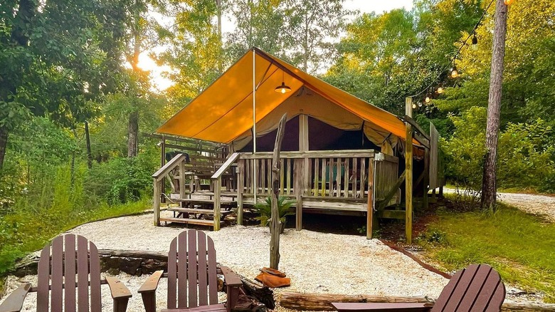 Outside glamping tent at Coldwater Gardens