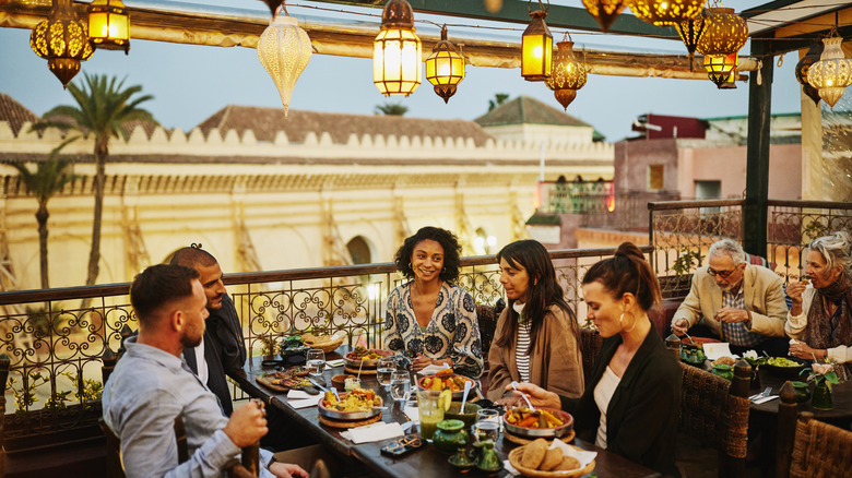 Tourists enjoy a meal in Morroco