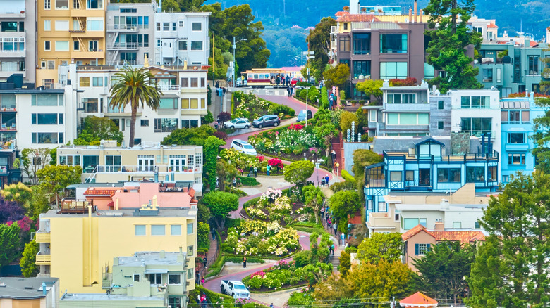 Cars make their way down curving Lombard Street in San Francisco