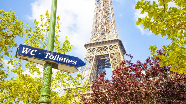 Toilet sign near Eiffel Tower