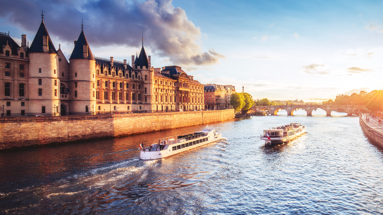 Passenger ships passing through Seine River in Paris