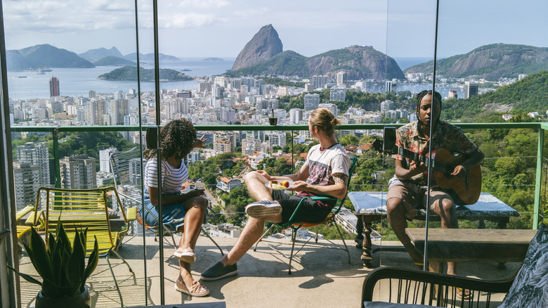 People on balcony in Rio