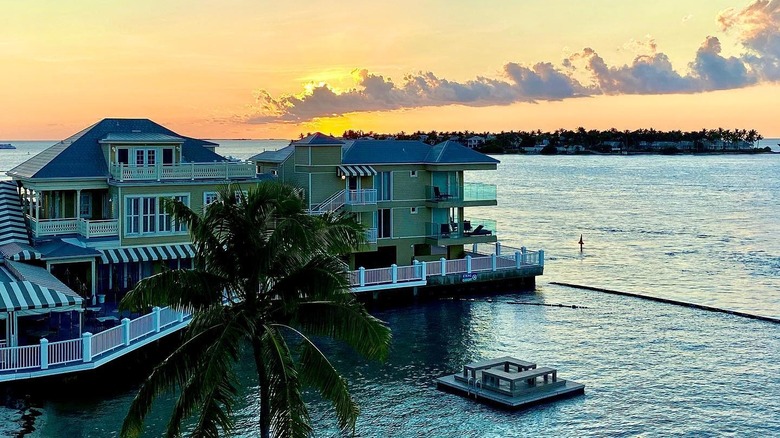 Resort on ocean at sunset