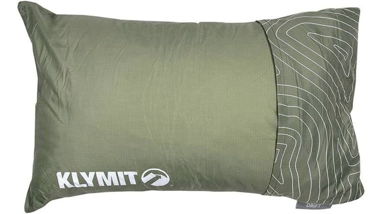 A green Klymit pillow