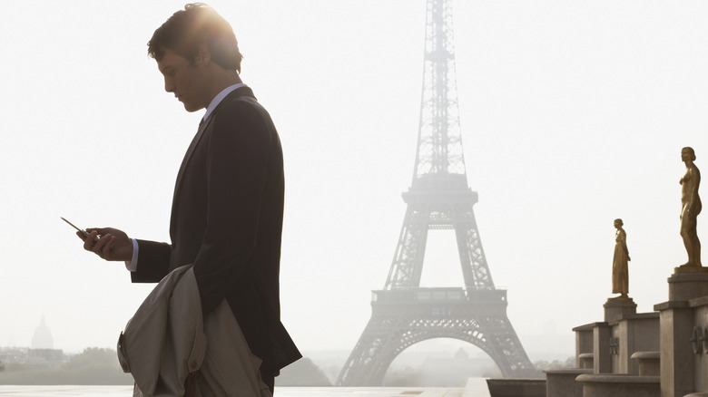 Stylish man and Eiffel Tower