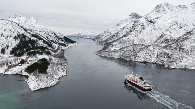 cruise ship through fjord